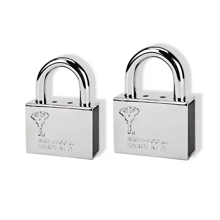 Mul-T-Lock MT5+ double-sided key showing telescopic pin cuts and milled sidebar pattern